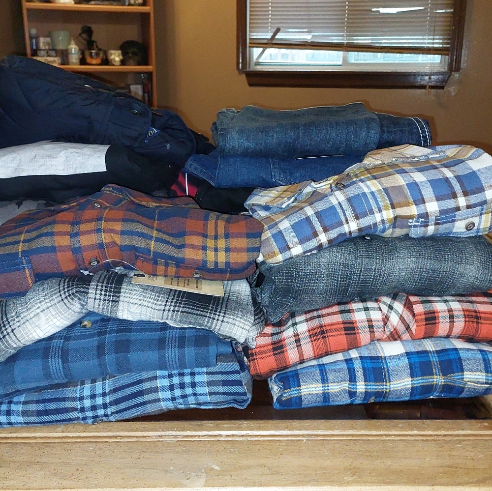 Lot of men's flannel shirts